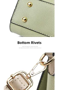 Vue détaillée du cuir grainé vert clair et des rivets métalliques dorés sur le fond