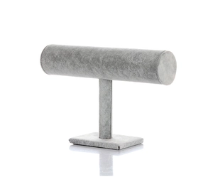 Close-up of grey velvet T-bar jewelry display stand with a stable base and soft texture