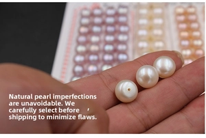 Macro shot of white, pink, and purple half-drilled freshwater pearls for DIY jewelry