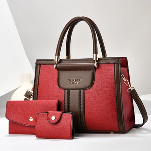 Three-piece red-brown patchwork handbag set with litchi texture and gold metal hardware