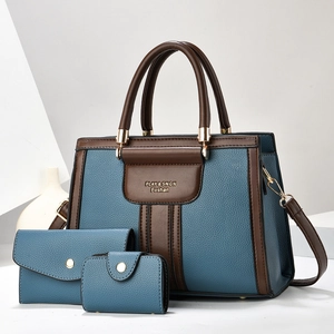 Detailed set of blue textured leather tote bag with matching wallet and clutch purse