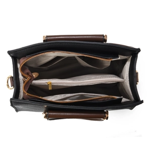 Top view showing the spacious interior compartments and gold zipper of the black handbag