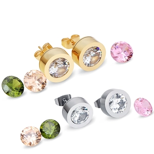 Detailed view of silver and gold 11mm earring studs with clear zircon and colorful gems