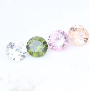 Detailed view of 11mm round zircon stones in clear, olive, pink and champagne colors