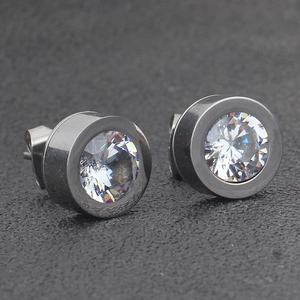 Macro view of 11mm stainless steel stud earrings featuring four clear round cubic zirconia