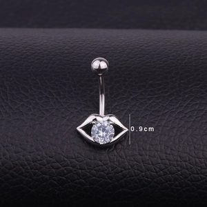 Macro view of lip-shaped navel ring with round cubic zirconia on black leather