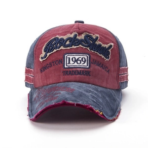 Detailed close-up of Rock Shark embroidery on vintage washed cotton baseball cap