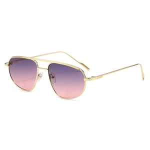 Fashionable aviator double bridge sunglasses with gold metal frame and pink gradient lenses