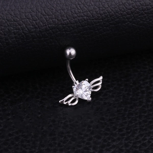 Macro shot of silver stainless steel heart zircon belly ring with wing design on black leather