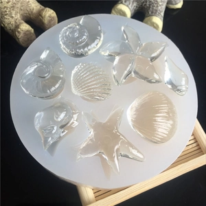 Silicone ocean theme mold for resin sea shells and starfish shapes on bamboo mat