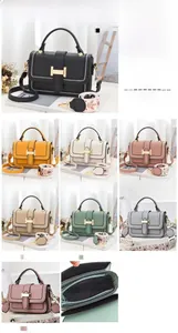 Detailed view of women's fashion crossbody bag interior showing organized compartments