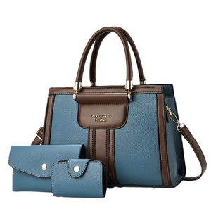 Three-piece women's tote bag set in blue and brown lychee grain faux leather