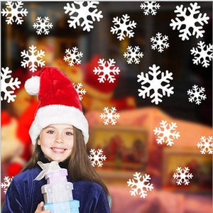 White snowflake window stickers in various sizes and shapes for Christmas decoration