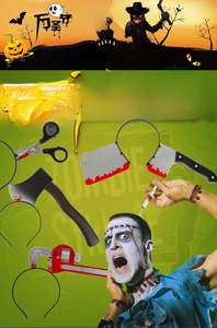 Macro detail of assorted bloody Halloween headband props including cleaver and syringe style