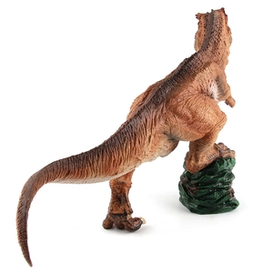 Detailed view of realistic skin texture and muscular details on a T-Rex dinosaur toy model