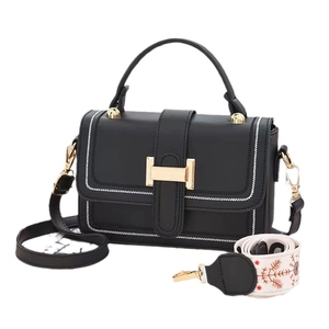 Classic black leather handbag with gold H buckle and two adjustable shoulder straps