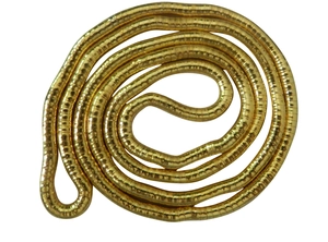 Macro view of flexible golden coiled snake bone chain necklace in a spiral layout