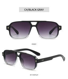 Close-up of black navigator sunglasses with double bridge and silver sword temple detail