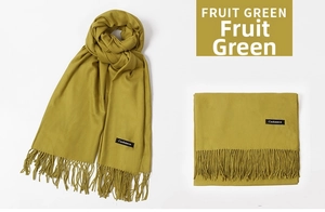 Macro detail of fruit green cashmere scarf featuring soft texture and elegant long tassels