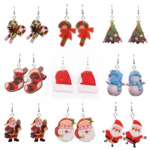 Detailed set of 9 assorted Christmas acrylic drop earrings with festive Santa and tree patterns