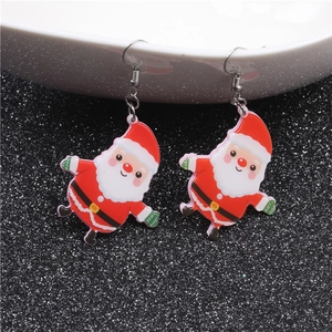 Macro detail of acrylic Santa Claus earrings with cool sunglasses and festive red finish