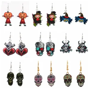 Detailed grid showing 9 pairs of acrylic Halloween earrings with skulls and witches