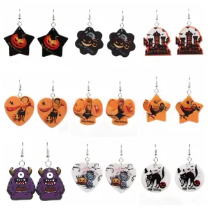 Macro shot of nine-piece acrylic Halloween earring set with pumpkin and ghost designs