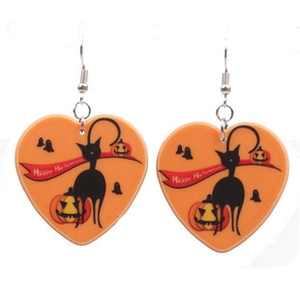 Detail of heart-shaped Halloween drop earrings with black cat, pumpkin and ghost patterns