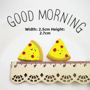 Detail of pizza-shaped resin charm with cute face and dimensions 2.5cm by 2.7cm
