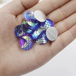 Detail of 16mm round blue-purple gradient resin fish scale flatback cabochons for DIY