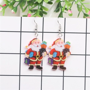Detail of acrylic Santa Claus earrings with cool sunglasses for Christmas festive wear