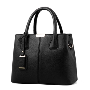 Classic black leather handbag for women with lychee texture and elegant gold hardware