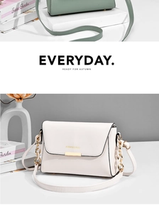 Detail of minimalist leather crossbody bags with gold chain straps and metal magnetic buckles