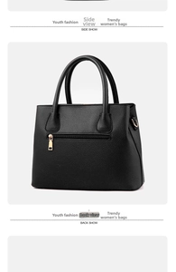 Detailed back view of black lychee grain handbag featuring a secure gold zipper pocket
