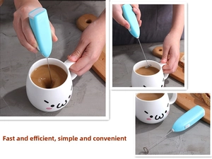 Detail of blue electric handheld milk frother stirring coffee in a ceramic cup