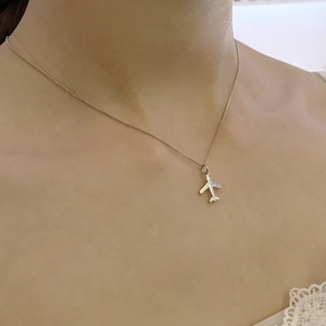 Minimalist 925 sterling silver necklace featuring a delicate 3D airplane pendant for women