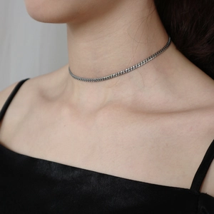 Minimalist 925 sterling silver thin Cuban link choker necklace worn on model neck