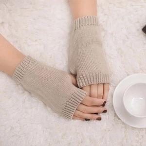 Detailed view of the rib-knit cuff design on thick khaki wool fingerless winter gloves