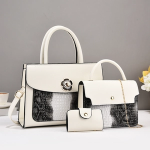 Elegant 3-piece faux leather handbag set with snakeskin pattern and floral twist lock
