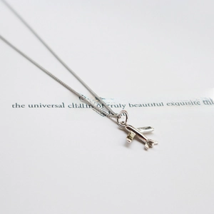 Minimalist 925 sterling silver airplane pendant necklace with a polished finish chain