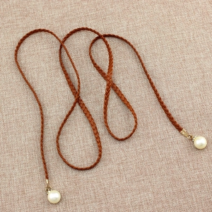 Elegant brown woven waist chain for women with white pearl pendants and gold accents