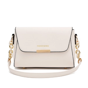 Minimalist cream white crossbody bag with gold metal trim and chain strap for women