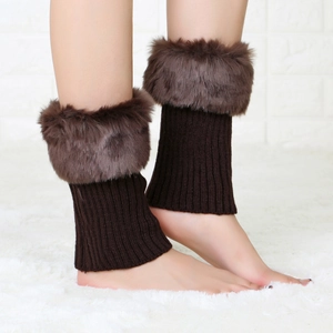 Detailed close-up of brown faux fur knit leg warmers showing texture and fluffy trim