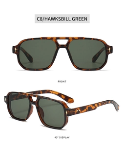 Detailed views of hawksbill square sunglasses with green lenses and gold metal rivets