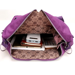 Purple waterproof nylon travel tote bag with large capacity and multi-pocket interior