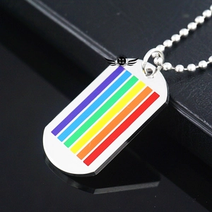 Detail shot of rainbow enamel metal dog tag pendant with stainless steel bead chain