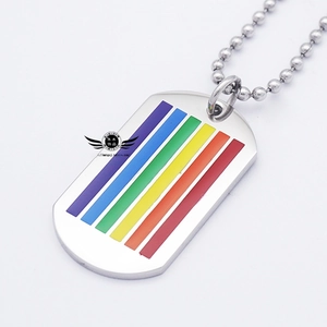 Macro detail of silver titanium military pendant featuring rainbow stripes on a bead chain