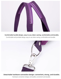 Detail of durable purple handbag with reinforced leather handle and silver metal hardware