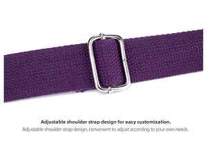 Detail of adjustable purple woven strap with silver metal buckle on a large travel tote bag