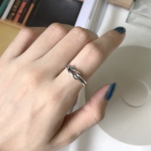 Minimalist S925 sterling silver double knot open ring with a polished metallic finish